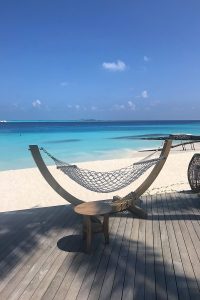 Fushifaru, hammock, Indian Ocean, sea, water villa, beach, sand blue sky, white clouds, blog post about Maldives on lifetime-pieces.com